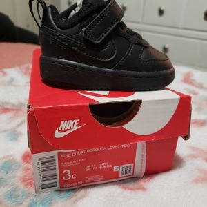 Black Nike infant shoe